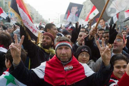 Demonstrators stage a rally in support of President Bashar al-Assad in Syria (file photo)